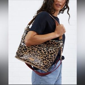 Consuela Blue Jag Hobo Crossbody Bag